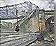 Famous Paintings - The Trinquetaille Bridge by Van Gogh